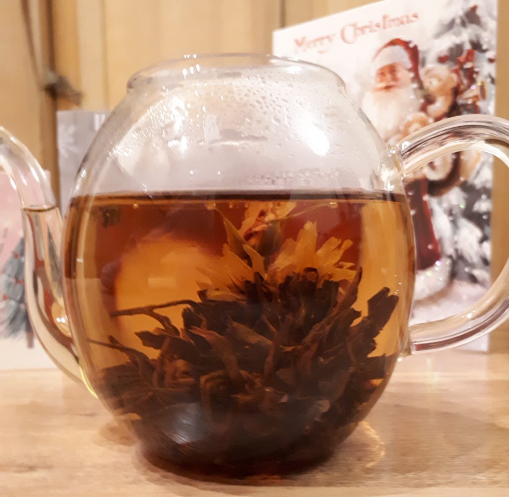 A-bloom black tea in glass teapot