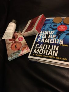 A signed book, chocolate coins and shells, hand cream and two eye masks.