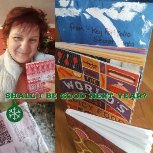 Clockwise from top left; Irina with her wrapped gift, gift bag, World's best spicy food book, patterned notebook, postage label.